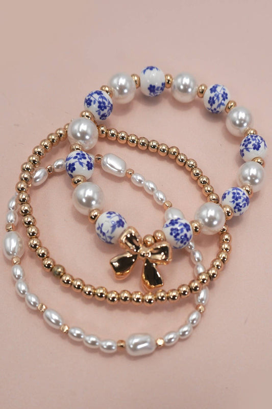 JOSSLYN BLUE CERAMIC PORCELAIN BOW MULTI LAYER BRACELET | 80B1333