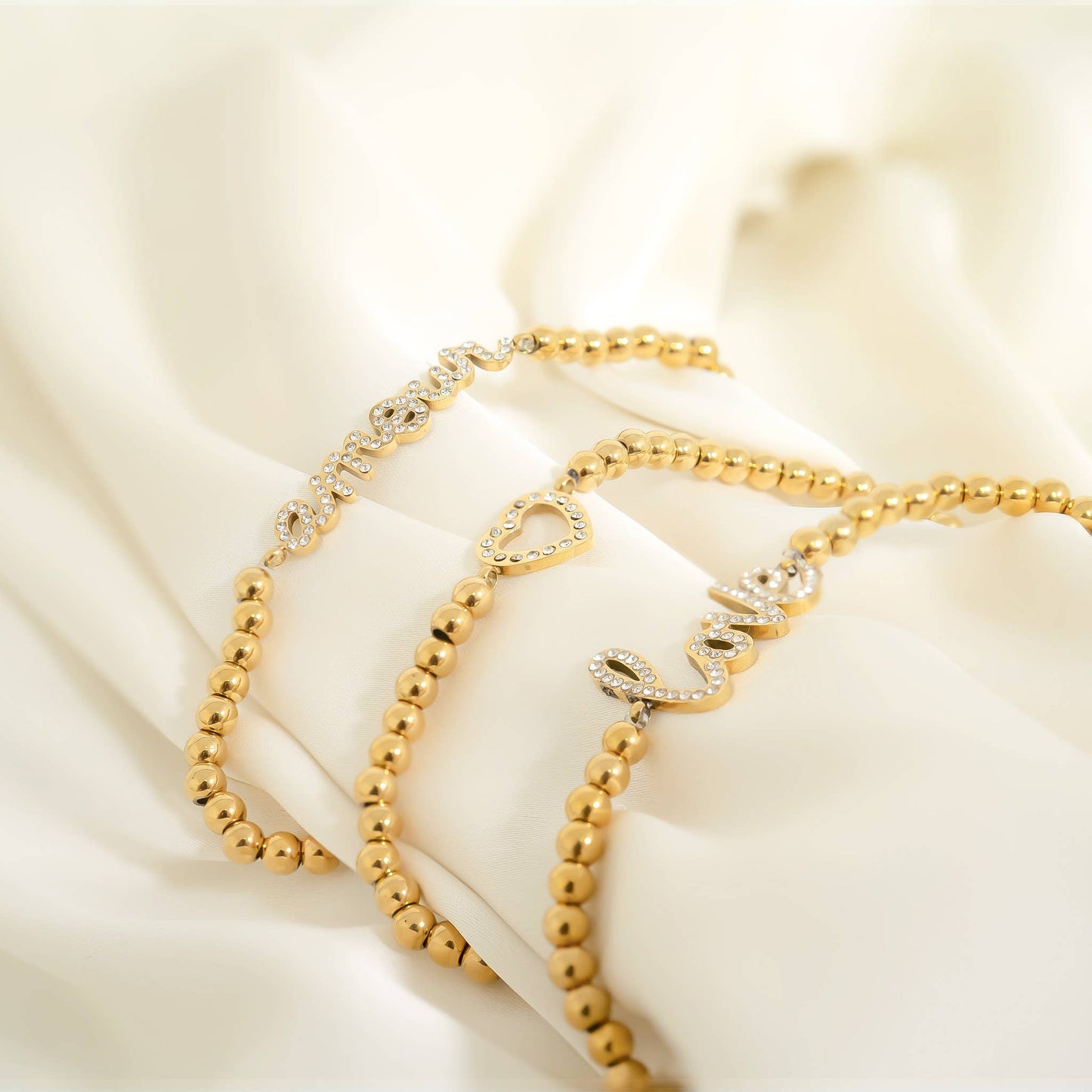 18K Gold PVD Stainless Steel Stone 'Amour' Metal Beaded Stretch Bracelet