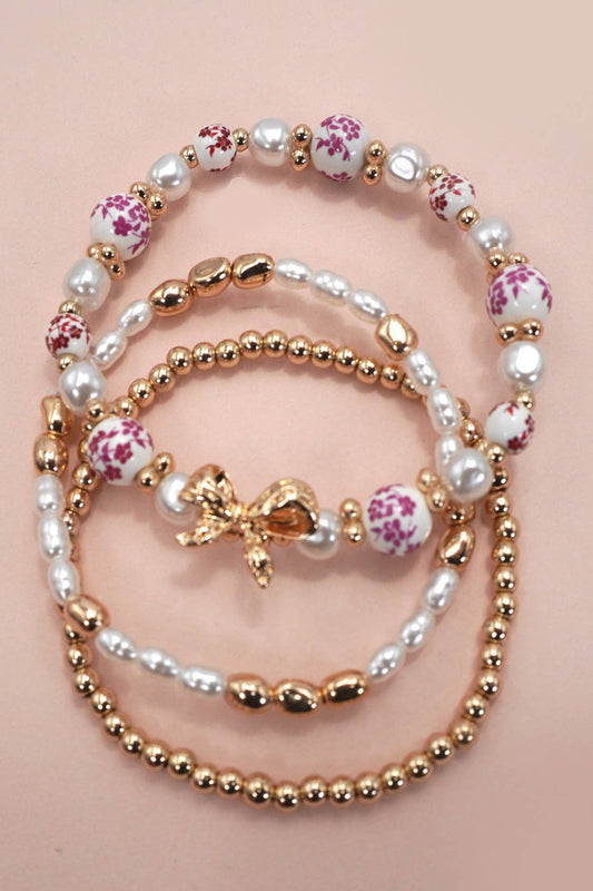 JOSSLYN PINK CERAMIC PORCELAIN BOW MULTI LAYER BRACELET